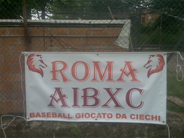 La roma si è portata lo striscione con scritto "Roma AIBXC"